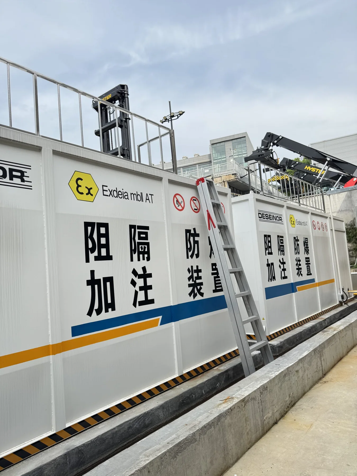 Integrated fiber safety monitoring for hazardous-material storage and loading — application illustration